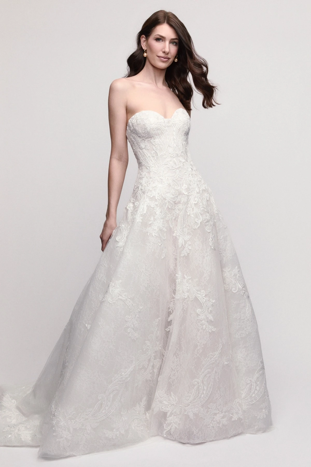 Model in white watters gown